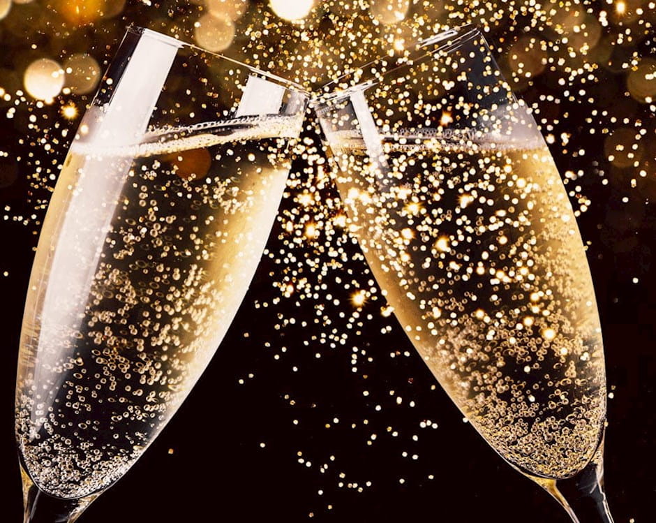 Champange glasses colliding for cheers