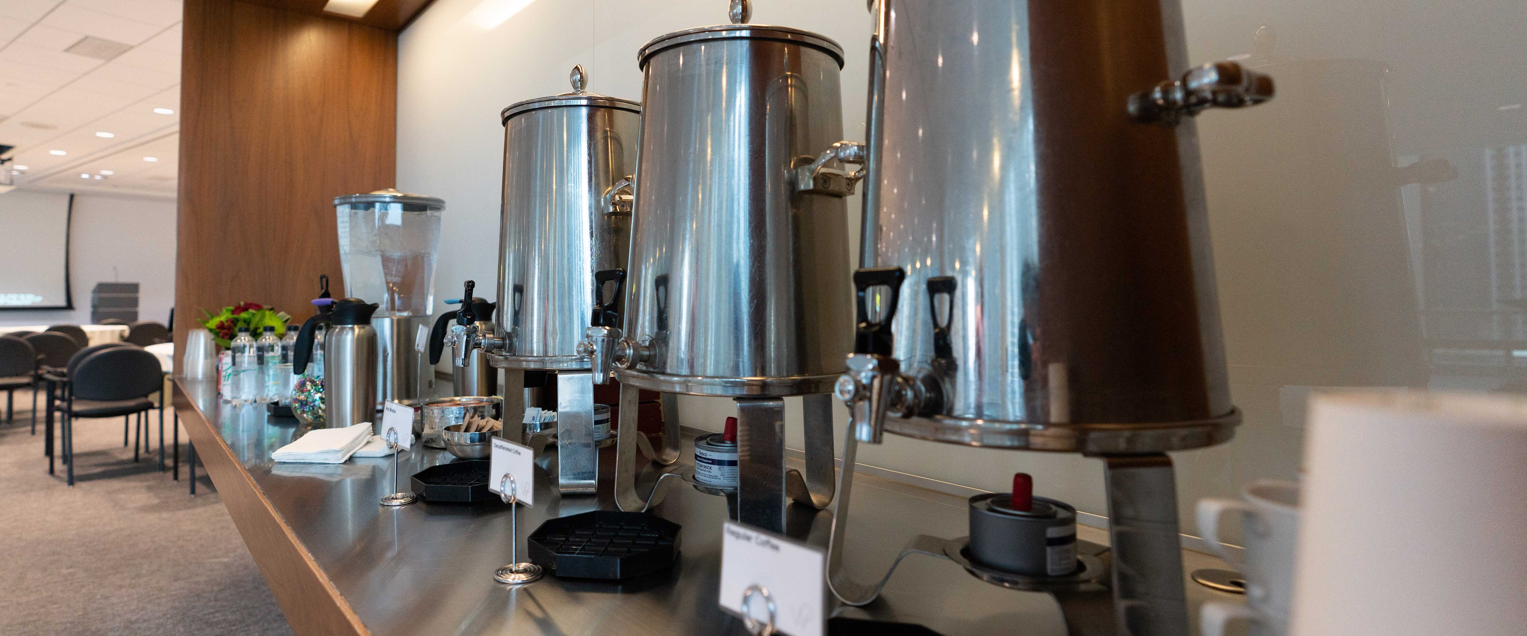 Coffee and water station at a conference room in the Gleacher Center