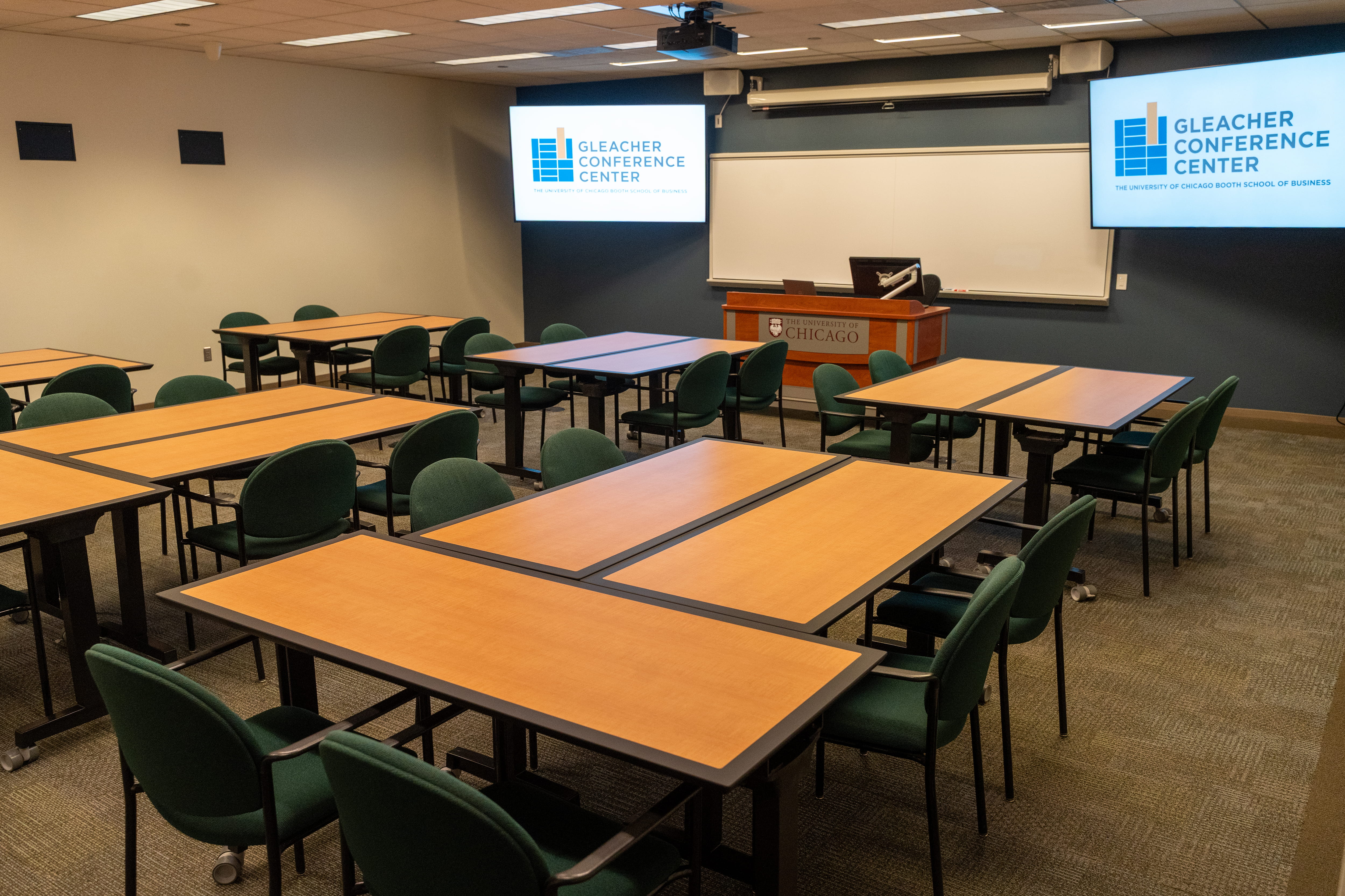 Executive Meeting Room arrangement with tables in groups.